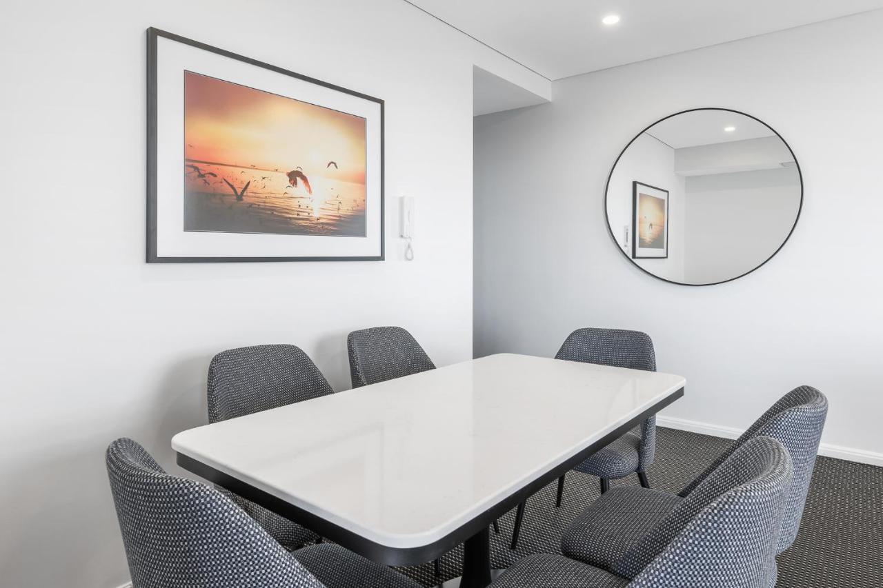 Meriton Suites Zetland Sydney Exterior foto A dining room