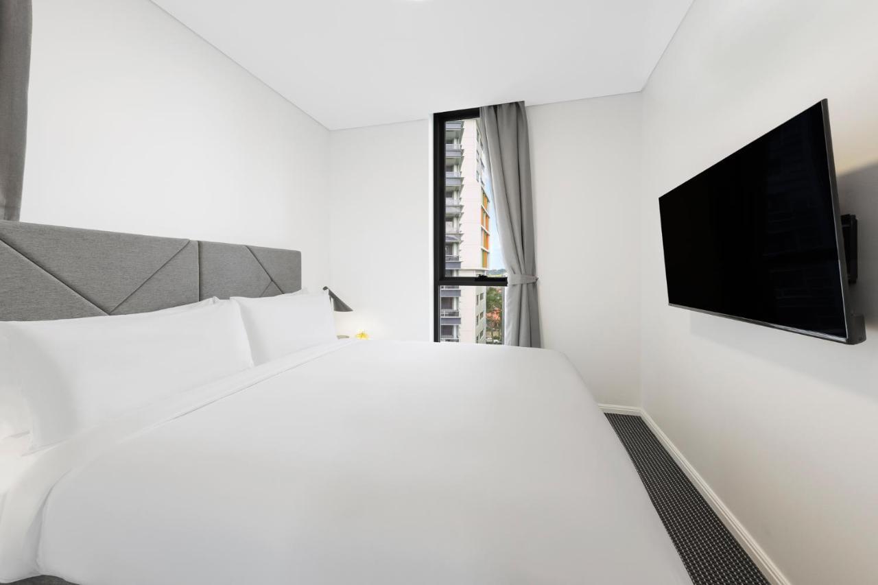 Meriton Suites Zetland Sydney Exterior foto A bedroom at the new student village